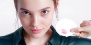 Push your hair back and cleanse your hairline