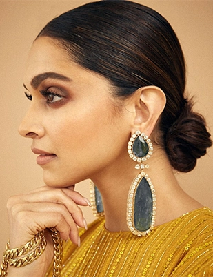 classic bun deepika padukone hairstyle