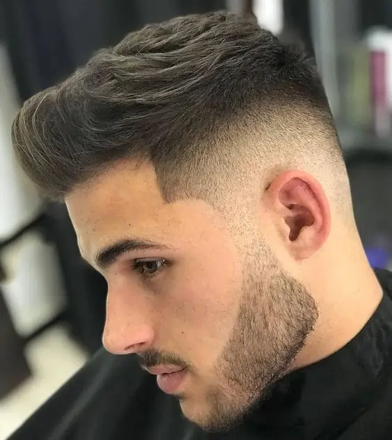 Pomp Top Mid Fade Haircut For Men